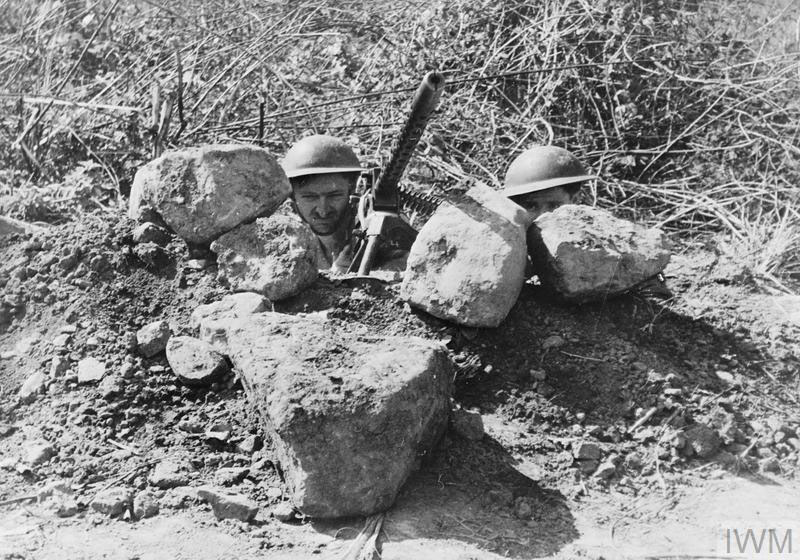 British troops in an improvised machine-gun nest at Kohima.