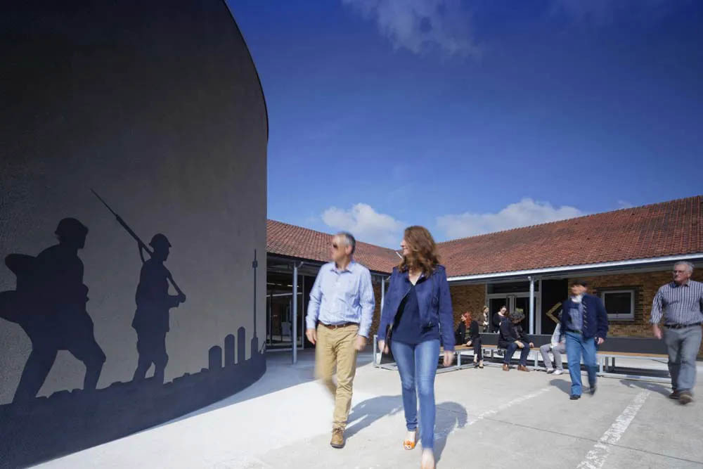 Visitors walk through the central courtyard of the CWGC Visitor Centre.
